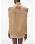 The-Lincoln-Lawyer-S03-Jazz-Raycole-Bronze-Bomber-Vest.jpg