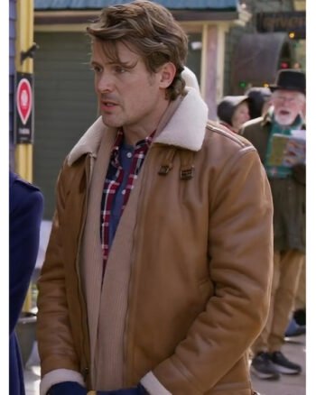 Believe-in-Christmas-John-Reardon-Brown-Leather-Jacket2-1.jpg