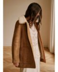 Playing-Nice-2025-Niamh-Algar-Camel-Suede-Coat.jpg