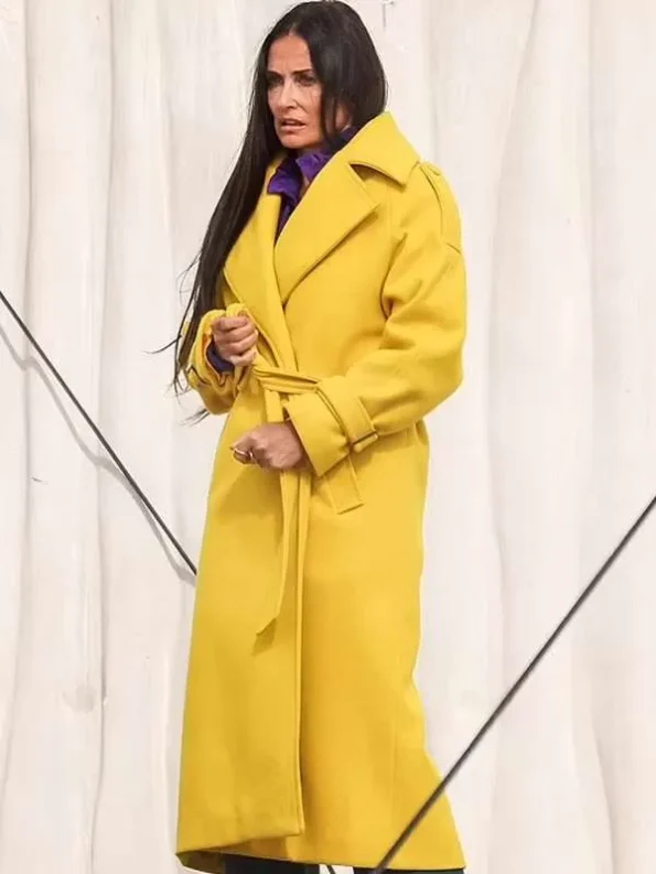 Demi-Moore-The-Substance-2024-Yellow-Coat.webp