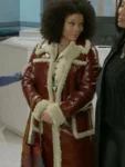 Eva-Thomas-Beyond-the-Gates-Brown-Leather-Coat.webp