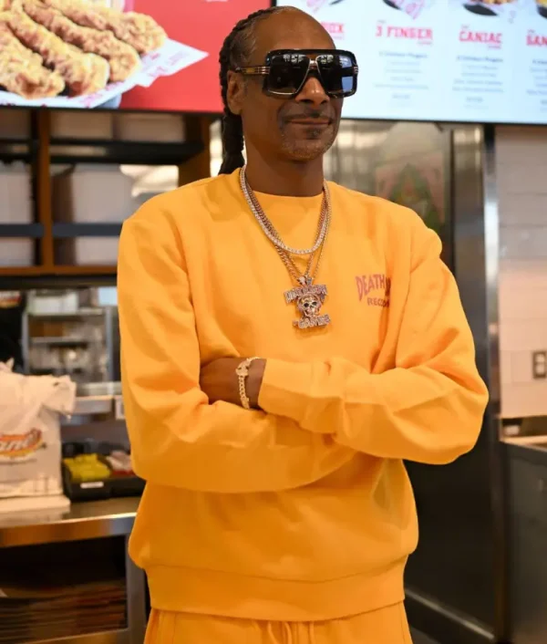 Snoop-Dogg-Raising-Canes-Shift-Orange-Sweatshirt.webp Snoop-Dogg-Raising-Canes-Shift-Orange-Sweatshirt.webp