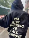 Sabrina-Carpenter-Im-Just-Drinking-To-Call-Someone-Hoodie1.jpg