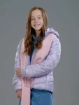 Ava-Weiss-The-Most-Colorful-Time-of-the-Year-Purple-Puffer-Jacket.webp