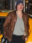 Lily-James-Relay-Brown-Leather-Jacket.webp