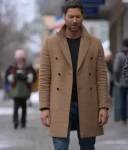 My-Secret-Santa-Ryan-Eggold-Wool-Coat.webp