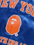 BAPE-X-MN-NBA-New-York-Knicks-Satin-Jacket-1.webp