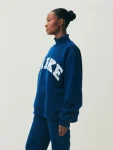 Parke-Holiday-Varsity-Turtleneck-Sweatshirt.webp