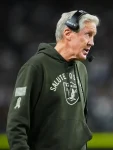 Pete-Carroll-Raiders-Salute-to-Service-Hoodie.webp