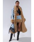The-Fall-Rise-of-Reggie-Dinkins-S01-Chloe-Troast-Denim-Coat.jpg